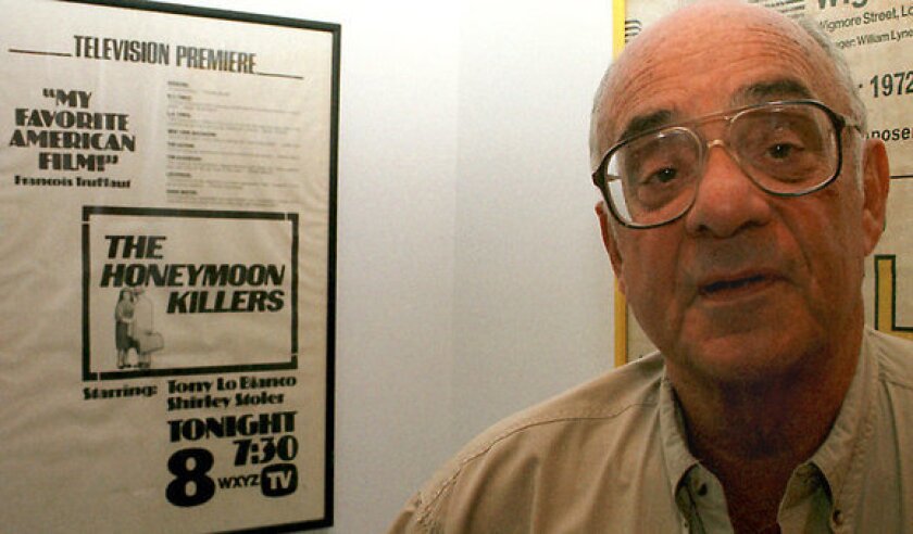 Leonard Kastle stands in front of a poster of the only movie he directed, the critically acclaimed "The Honeymoon Killers."