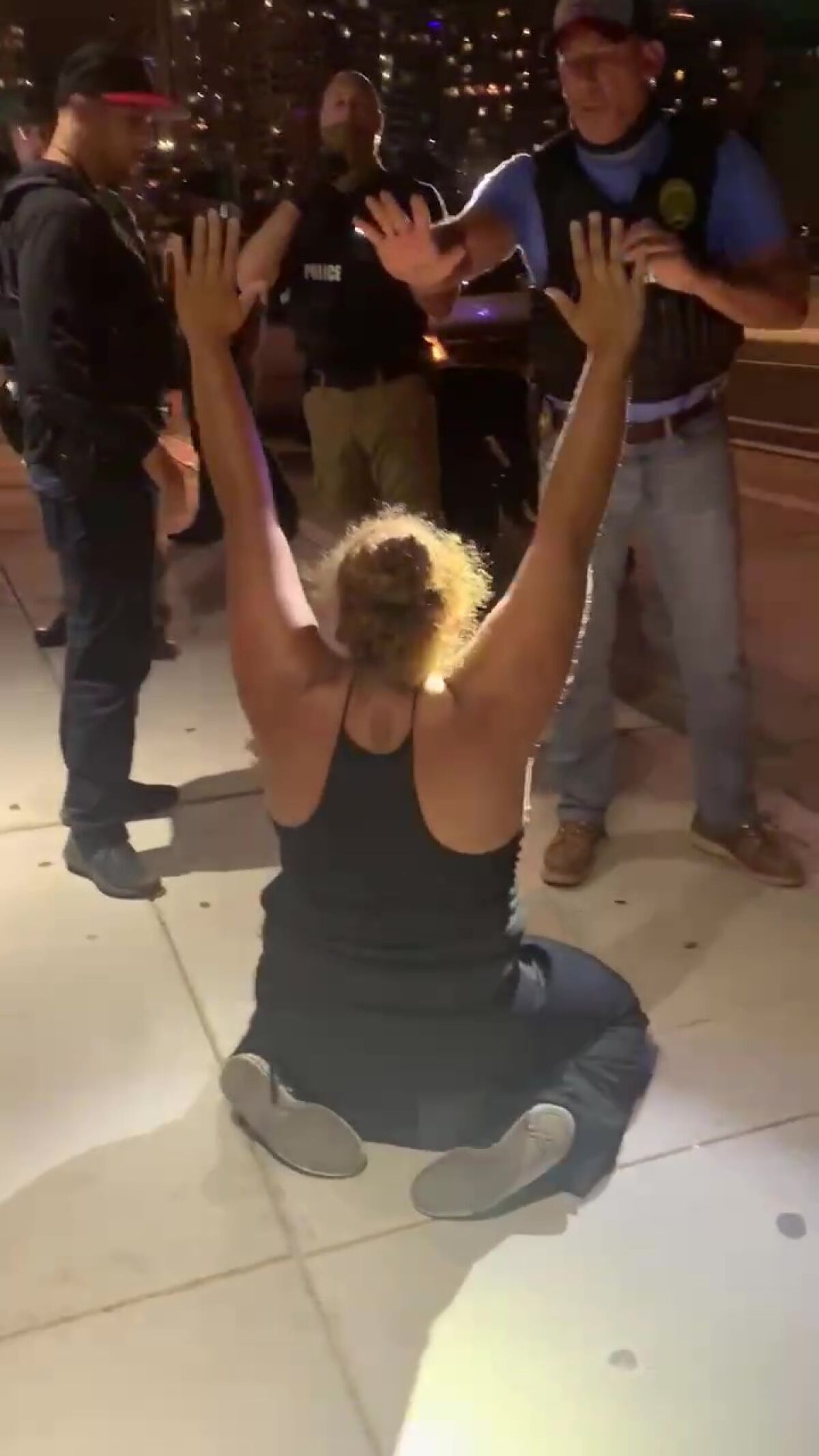 Protester who was arrested, hauled off in unmarked van sues San Diego city, police - The San Diego Union-Tribune