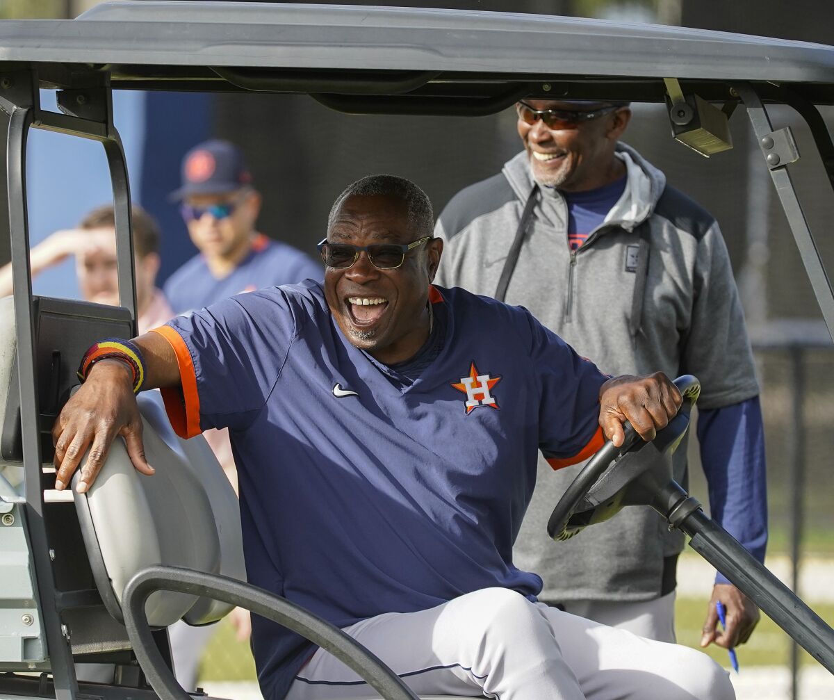 Houston Astros manager Dusty Baker, Jr. laughs during a spring training baseball workout, Saturday, March 19, 2022 in West Palm Beach, Fla.(Karen Warren/Houston Chronicle via AP)