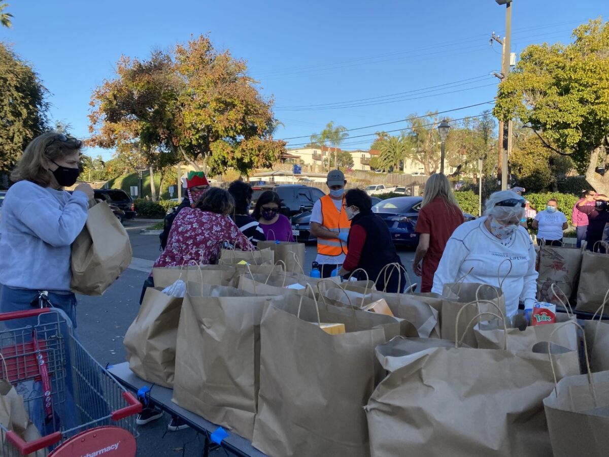 Volunteers helped sort and package donations.