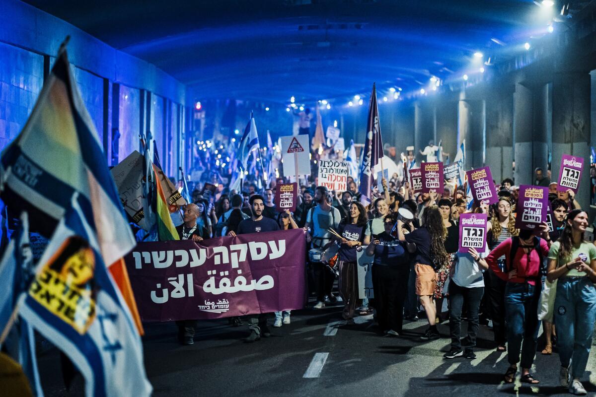 Protesters calling for a cease-fire in the Gaza Strip march through central Jerusalem on April 2.