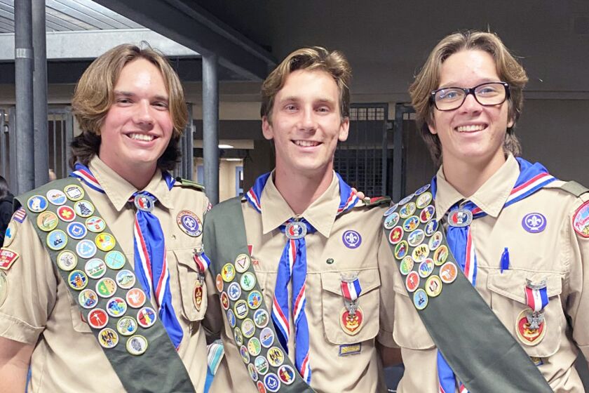 Noah Campillo, Noah Luken and Callan Anderson at their Eagle Scout Court of Honor on Monday evening.