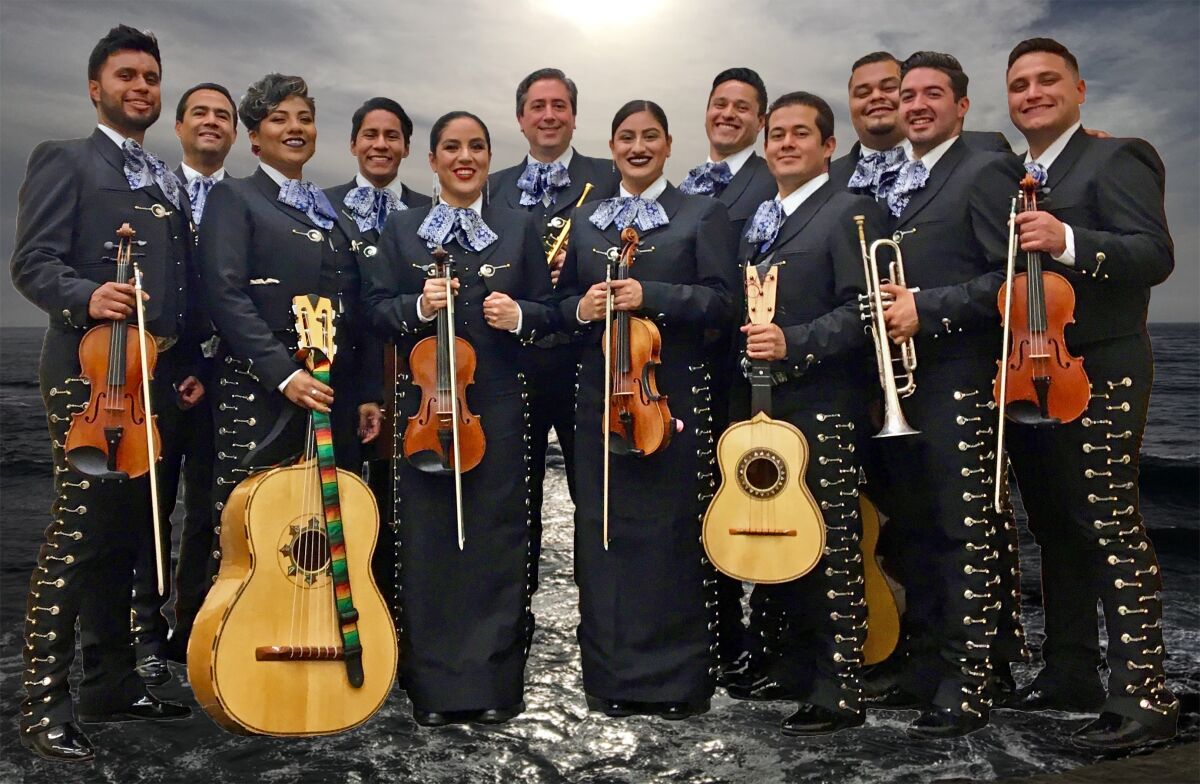 Trumpeter and composer Jeff Nevin, center, and Mariachi Champaña Nevin