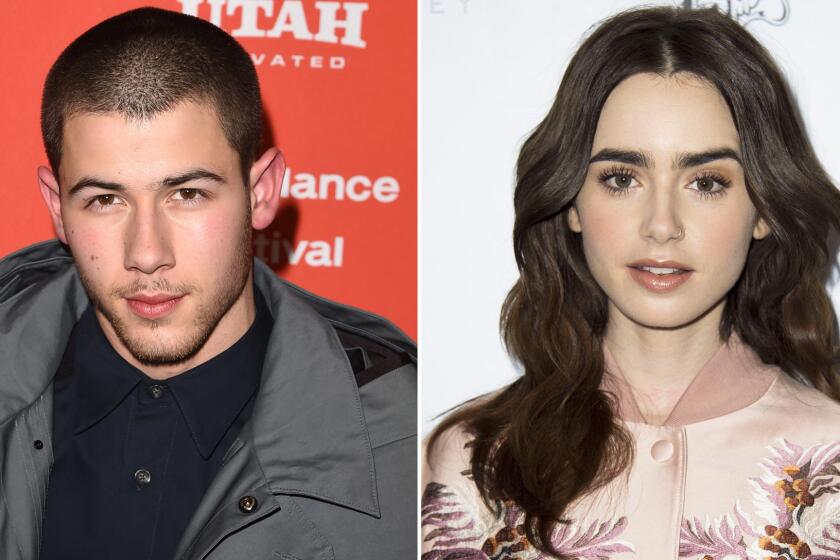 Nick Jonas and Lily Collins are reportedly dating.