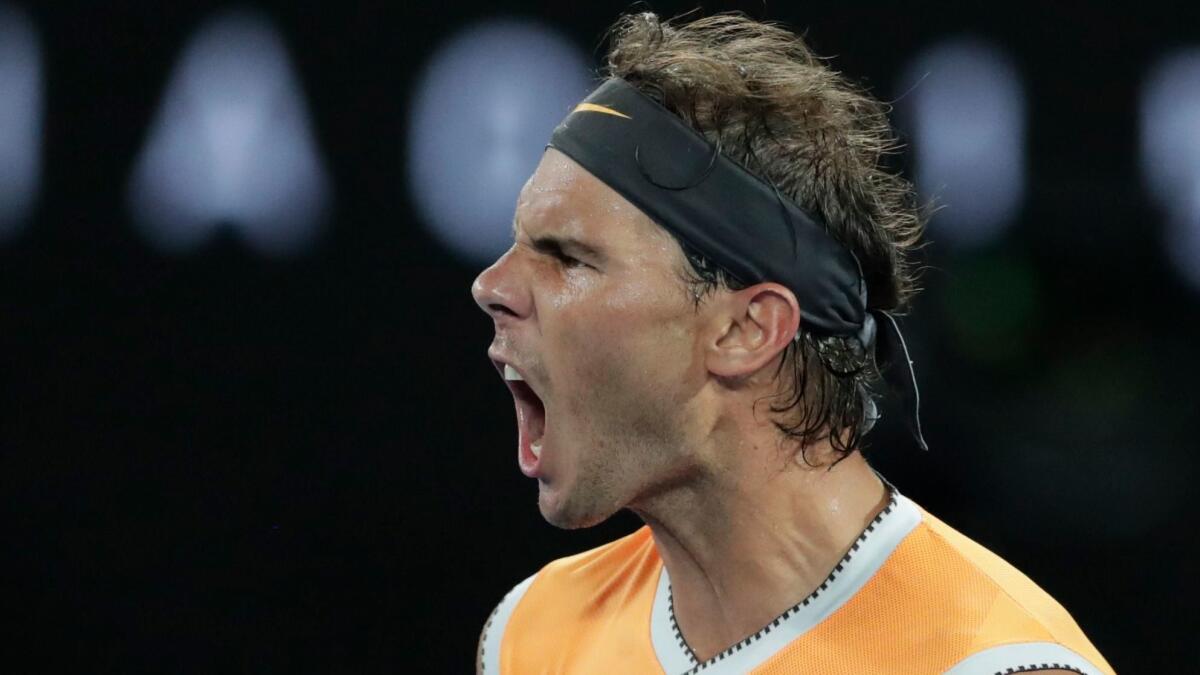 Rafael Nadal celebrates after winning his men's singles semifinal match against Stefanos Tsitsipas on Thursday at the Australian Open.