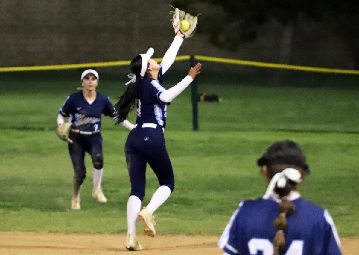 Marina's Rachel Ruiz (9) catches a pop up at second base against Poway in the Michelle Carew Classic.
