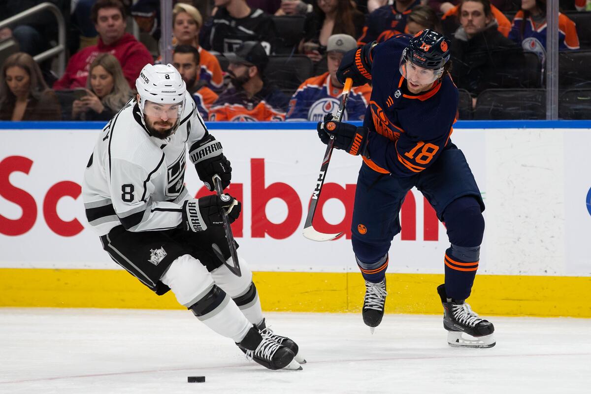 Edmonton Oilers' James Neal (18) battles for the puck against Kings' Drew Doughty (8) on Friday in Edmonton, Canada. 