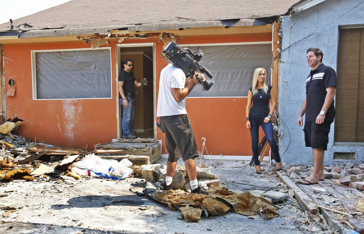 Husband and wife team Christina and Tarek El Moussa film "Flip or Flop" while renovating a 1930s home in Anaheim.
