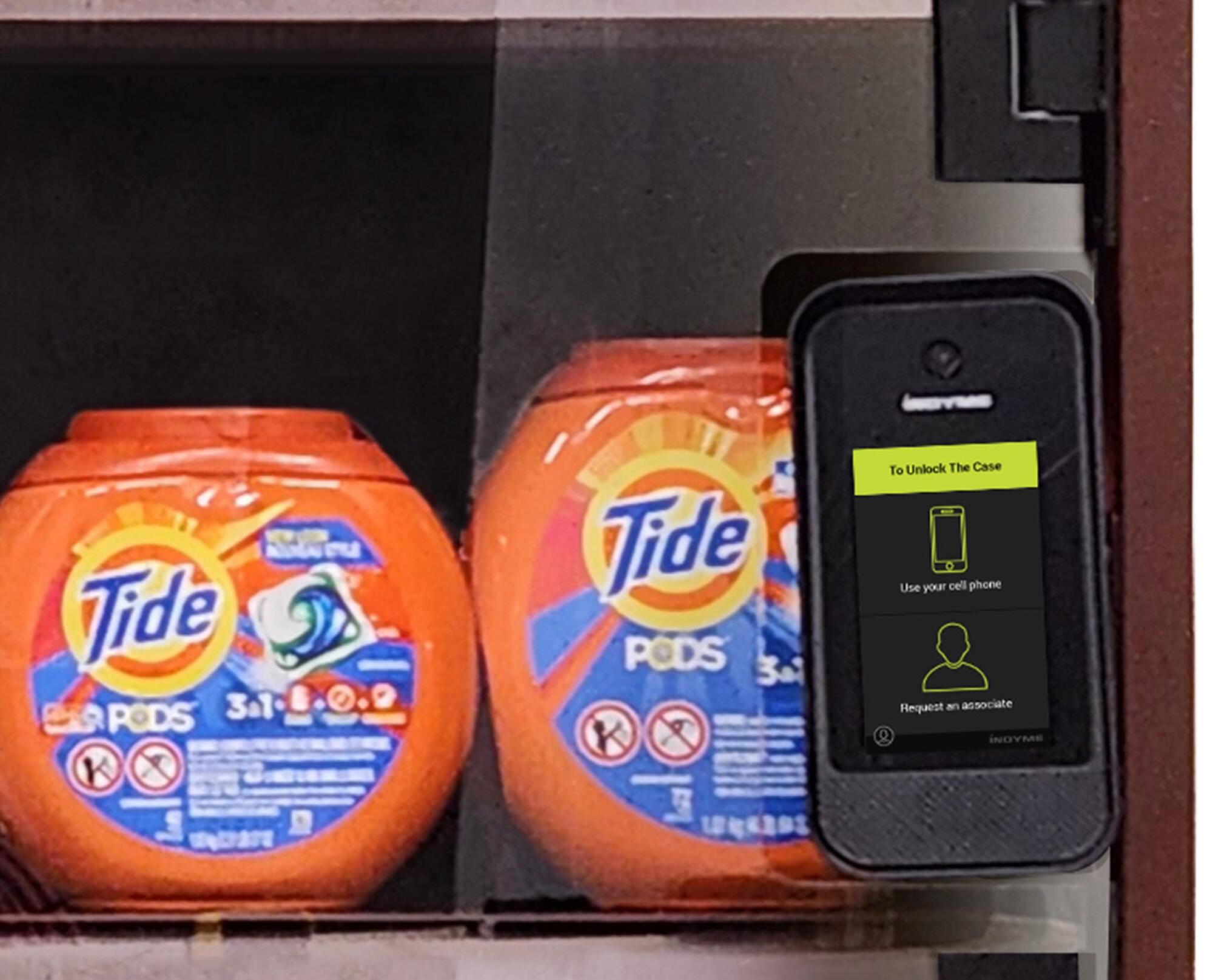 Tide Pods locked behind a cage.
