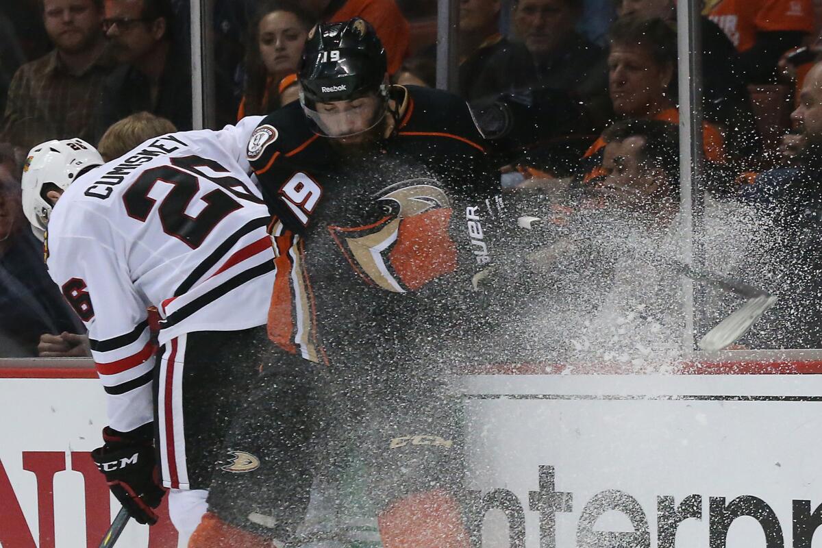 Ducks forward Patrick Maroon collides with Blackhawks defenseman Kyle Cumiskey during the first period of Game 5 of the Western Conference finals.