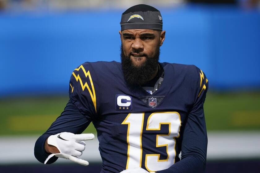 Los Angeles Chargers wide receiver Keenan Allen (13) warms up before an NFL football game against the Seattle Seahawks Sunday, Oct. 23, 2022, in Inglewood, Calif. (AP Photo/Marcio Jose Sanchez)