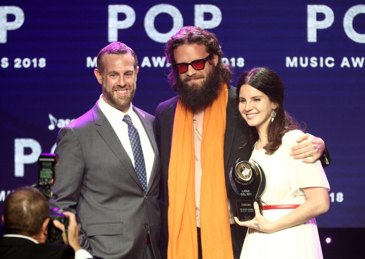 Jason Silberman, left, Father John Misty and Lana Del Rey at the 35th annual ASCAP Pop Music Awards at the Beverly Hilton Hotel in Beverly Hills on Monday.