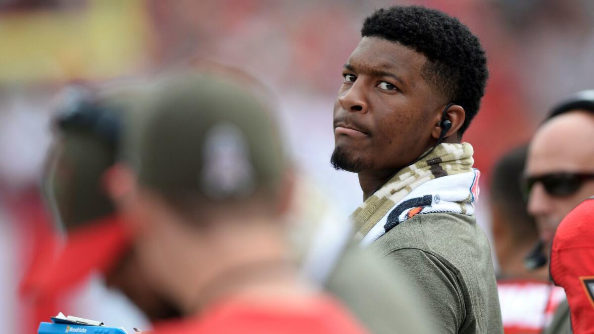 Tampa Bay Buccaneers quarterback Jameis Winston watches from the sideline during a game against the New York Jets on Nov. 12.