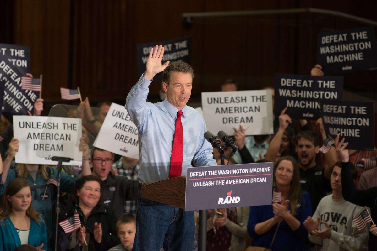 Sen. Rand Paul of Kentucky appears Friday in Iowa City, Iowa, as part of his first campaign swing into early voting states.