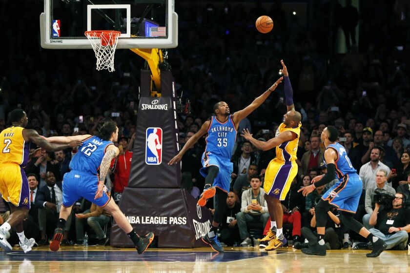 Lakers forward Kobe Bryant claimed he was fouled by Thunder forward Kevin Durant (35) in the final seconds Friday night, but the NBA disagreed.