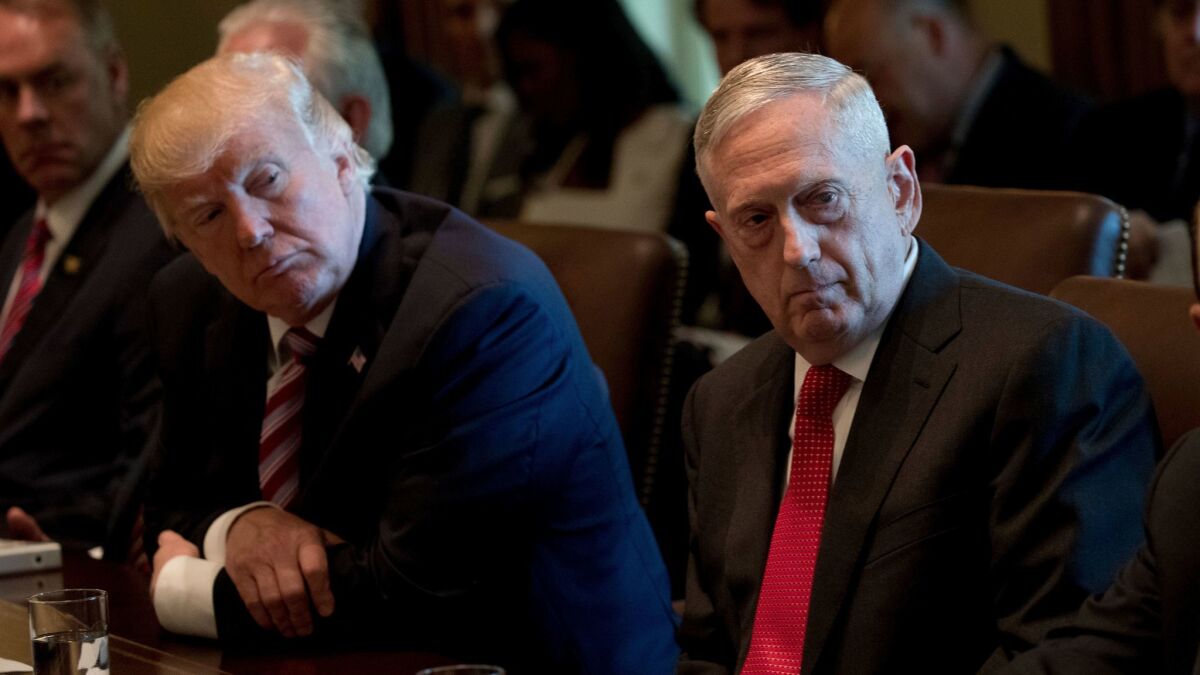 President Donald Trump and Defense Secretary Jim Mattis attend a Cabinet meeting in the White House on June 12.