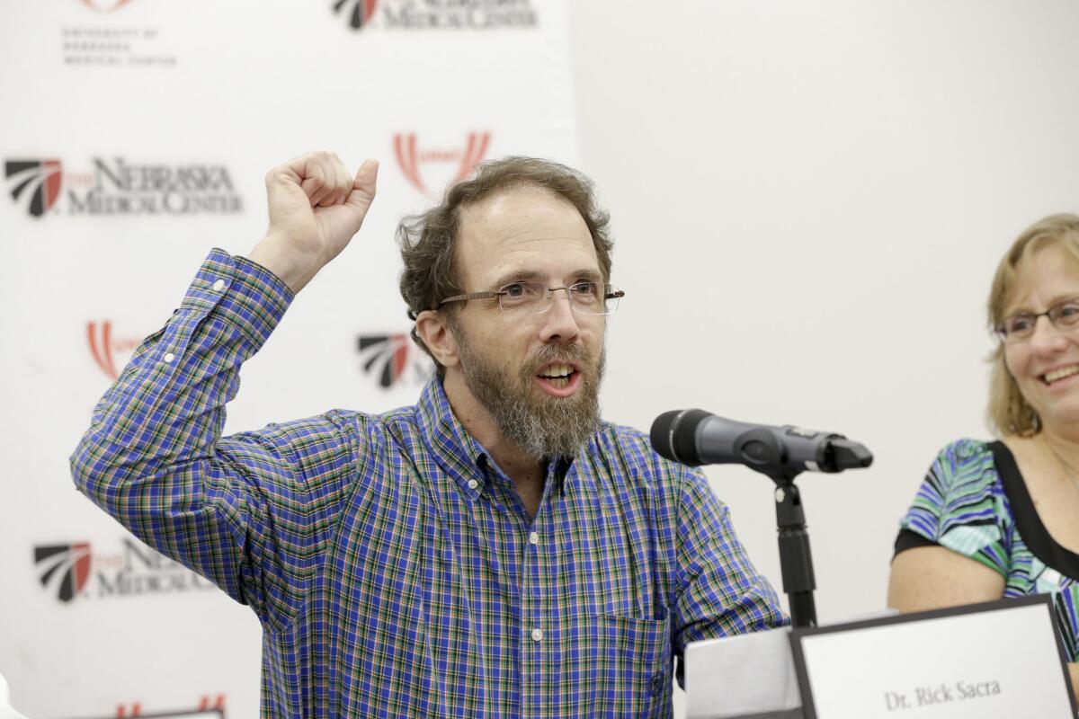 Former Ebola patient Dr. Richard Sacra at a news conference at the Nebraska Medical Center in Omaha, Neb. As part of his treatment, he received a transfusion of convalescent plasma.