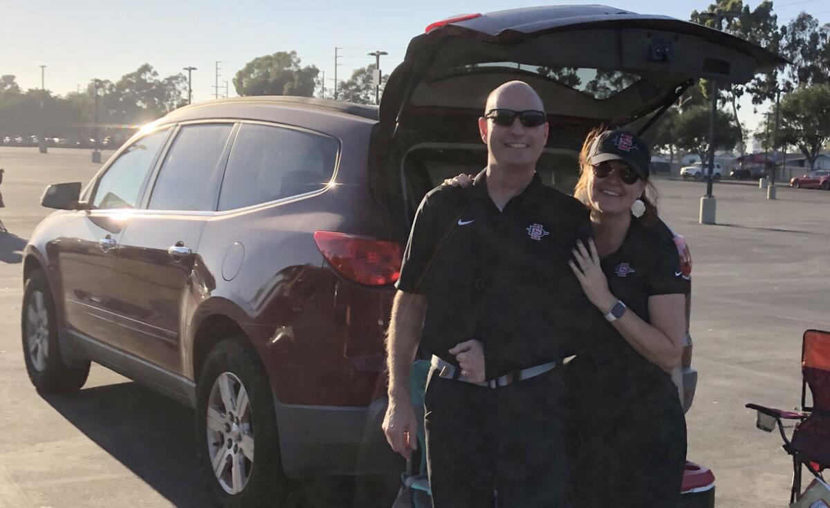 Jordan and Kristina Evans of Pasadena enjoyed having a shorter drive than normal to see a San Diego State football game.