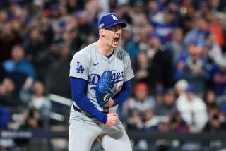 NEW YORK, NEW YORK - OCTOBER 16: Walker Buehler #21 of the Los Angeles Dodgers reacts.