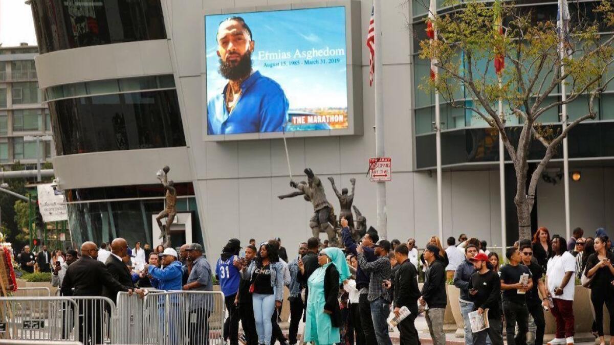 Crowds attend the Nipsey Hussle celebration of life memorial at Staples Center.