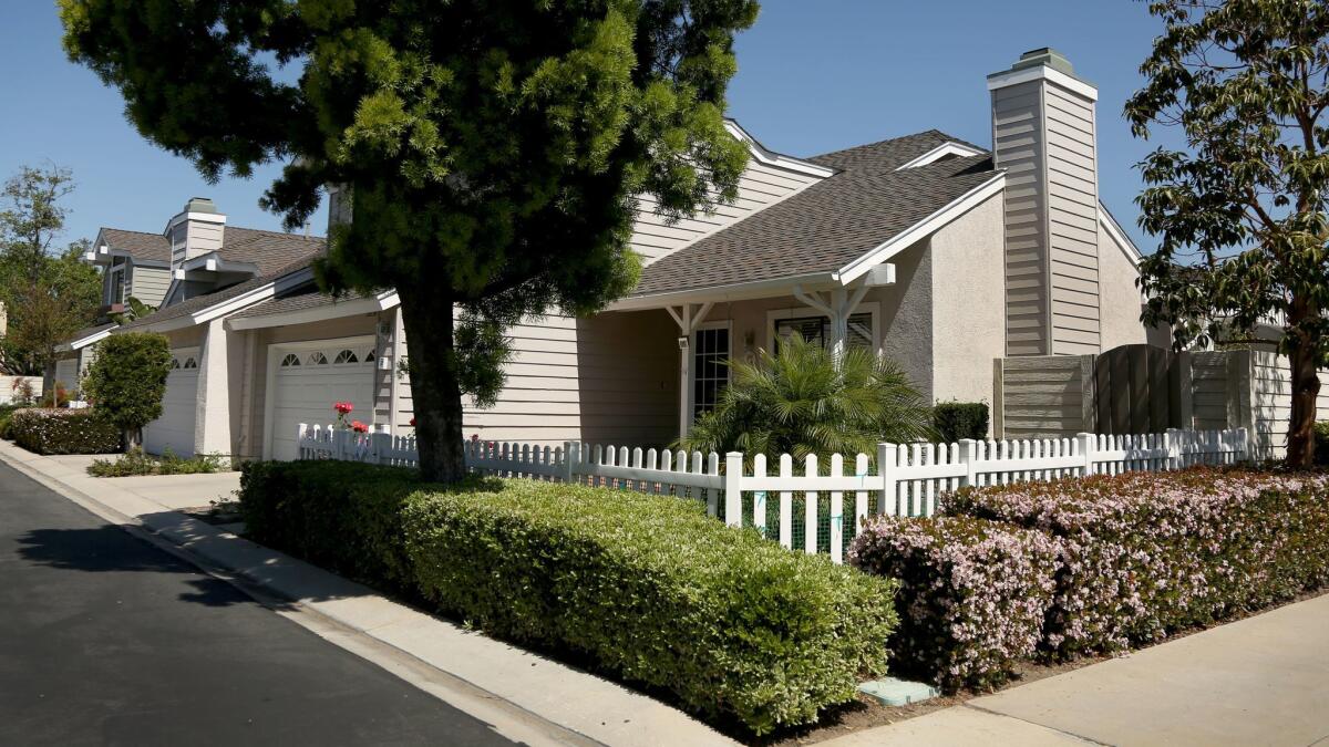 Authorities arrested Hong “Gina” Jing in this Irvine home and charged her with multiple counts of racketeering and sex trafficking.