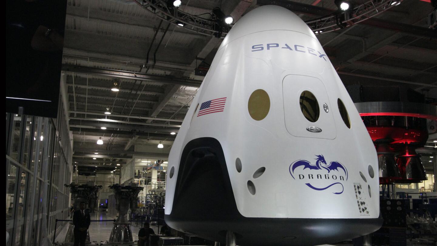 SpaceX's Dragon V2 capsule is designed to carry seven people and will be reusable.