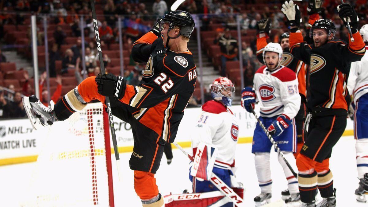 Ducks' Dennis Rasmussen (22) reacts to scoring a goal as Montreal Canadiens' Carey Price (31) looks on during the first period on Friday.