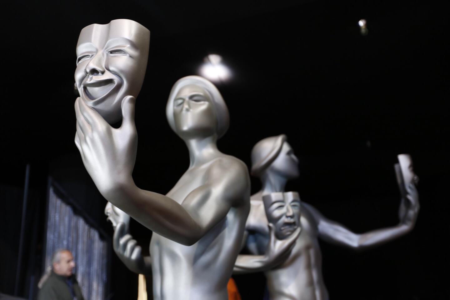 Large versions of the Screen Actors Guild Awards statues await placement on stage Friday morning as preparations continue for the 23rd Screen Actors Guild Awards show Sunday.