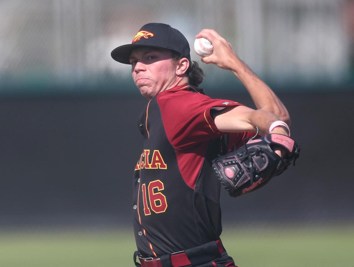 Estancia starting pitcher Andrew Mits throws in the first inning of Friday's game at Costa Mesa High.