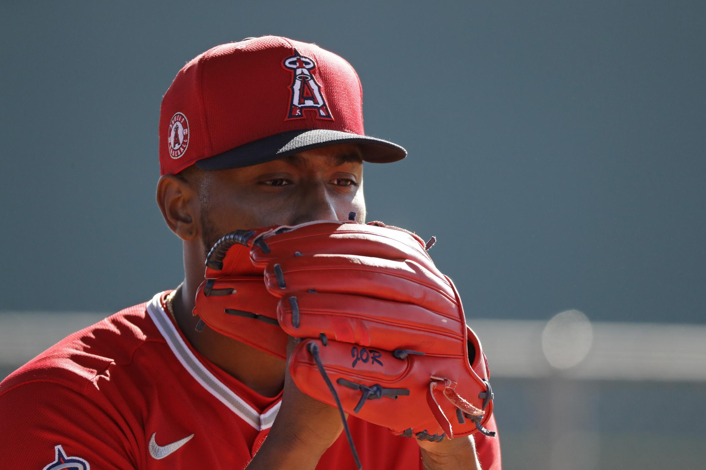 Angels starting pitcher Julio Teheran throws during spring training baseball practice.