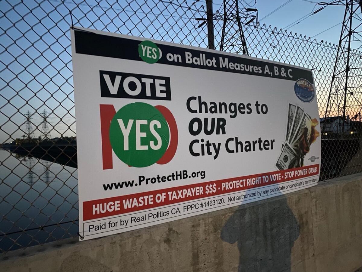 "Vote No on Measures A, B & C" signs were found vandalized Wednesday morning, with "Yes" stickers placed on them. 