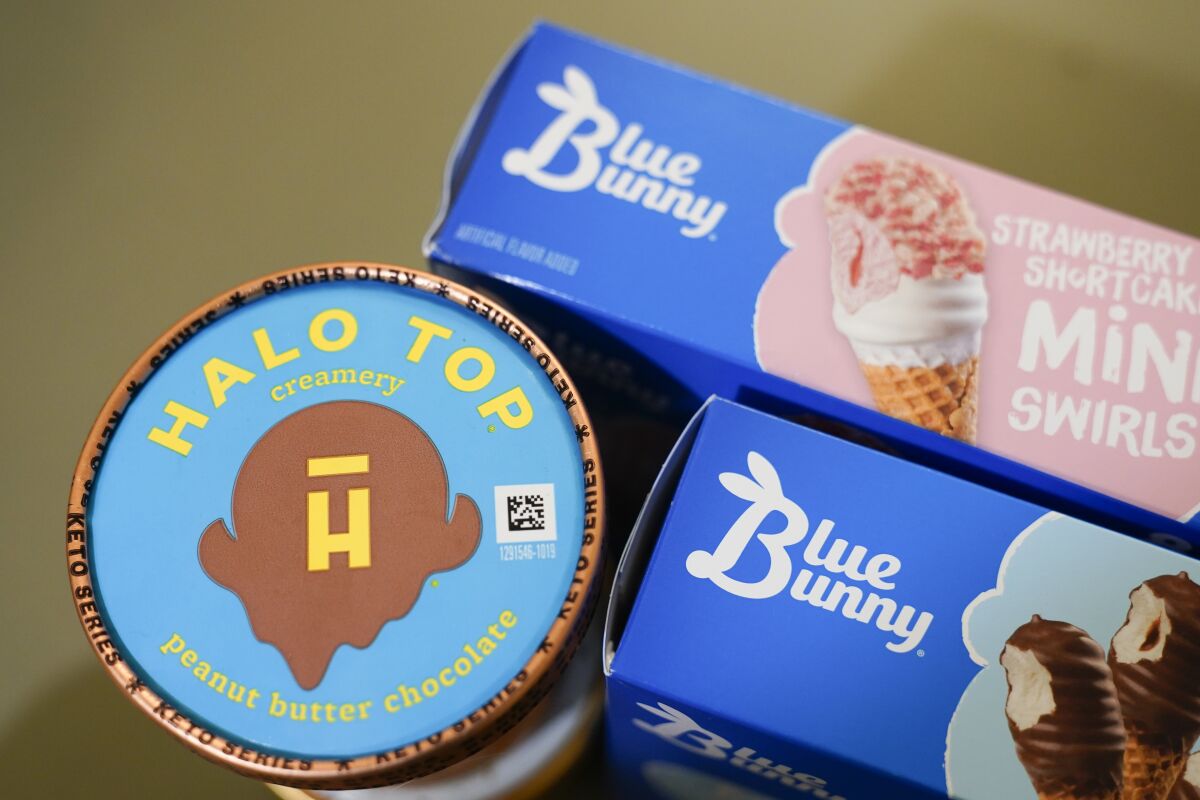Blue Bunny and Halo Top brand ice cream products are seen in Englewood, N.J., The Italian confection company Ferrero Group announced Wednesday that it's acquiring Wells Enterprises, the Iowa-based maker of Blue Bunny and Halo Top ice creams. Wells, founded in 1913, is one of the world's largest family-owned ice cream companies.Tuesday, Dec. 6, 2022. (AP Photo/Seth Wenig)
