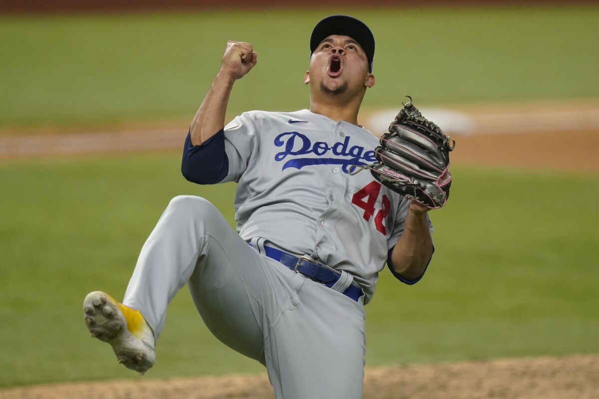 Dodgers reliever Brusdar Graterol reacts after the final out of the eighth inning against the Rays in Game 4.