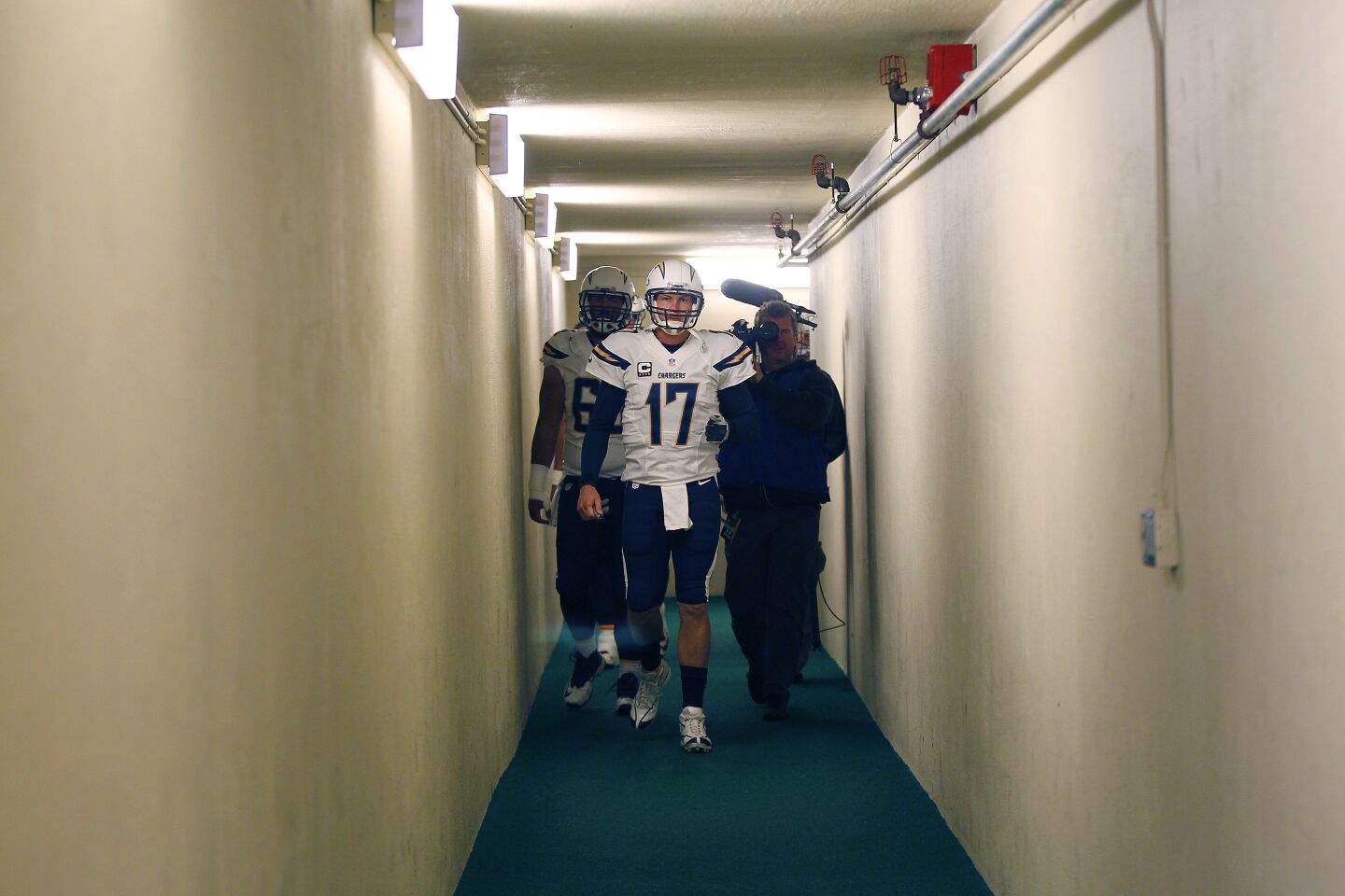 Chargers Philip Rivers walks to the field before a game against the Green Bay Packers on 10/18/15