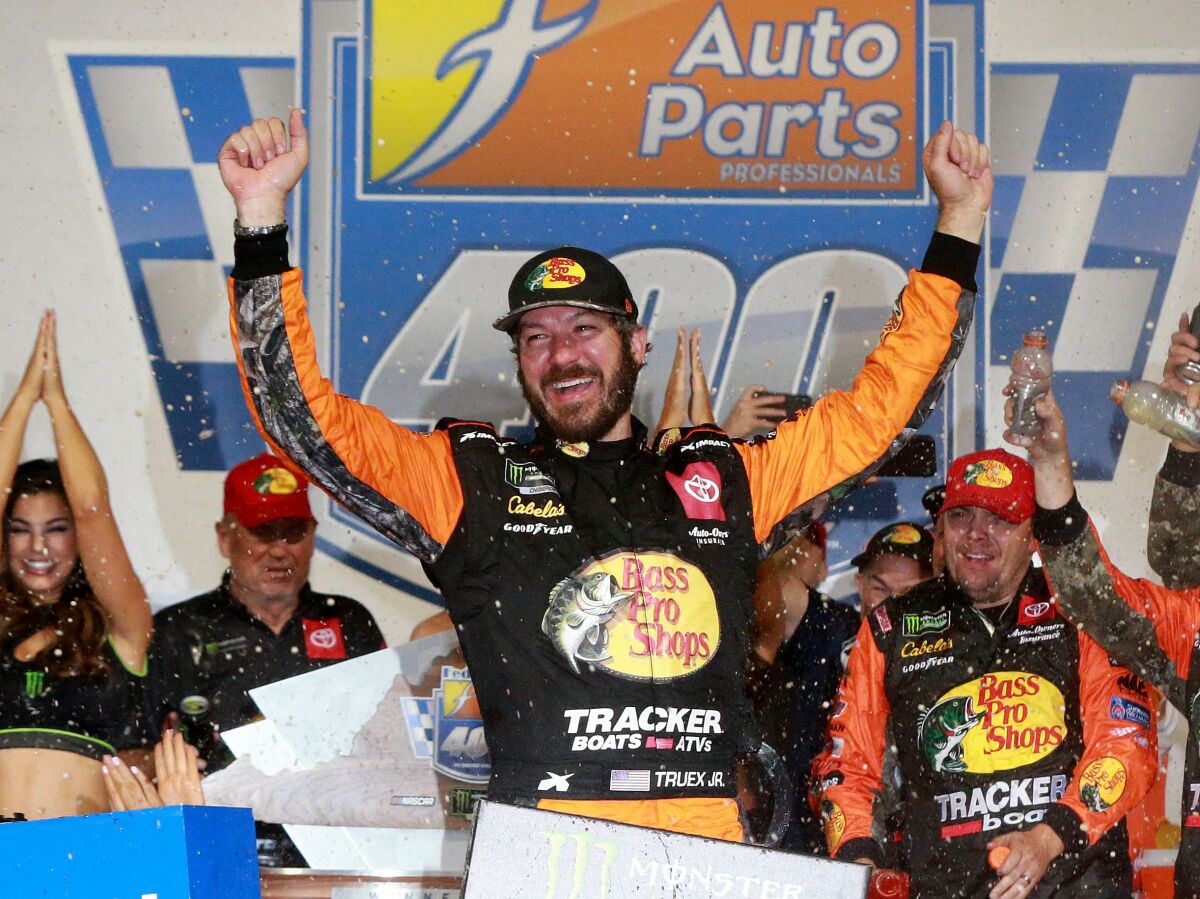 Martin Truex Jr. celebrates his NASCAR Cup victory at Richmond Motor Speedway on Saturday.