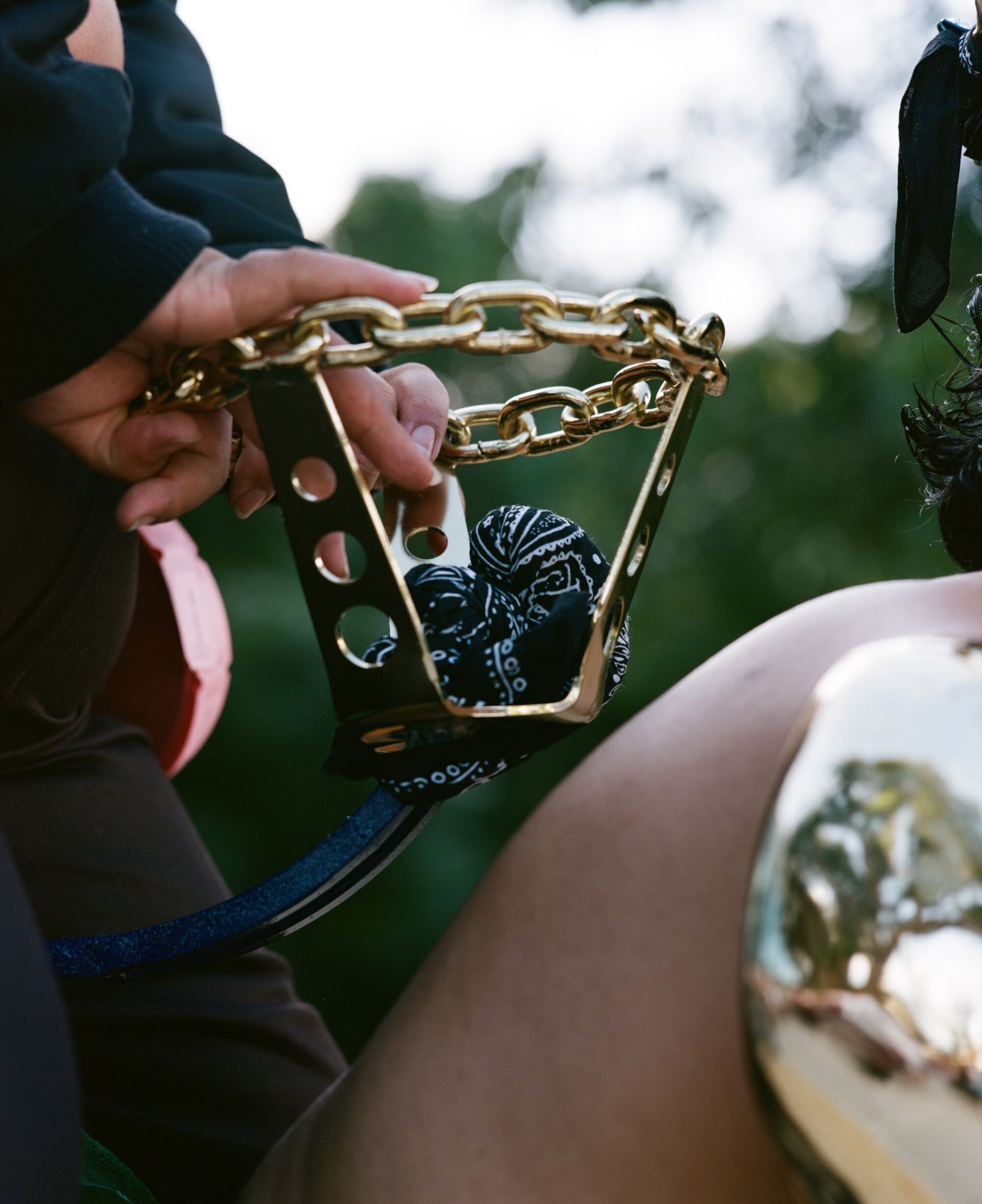 Photo of gold steering wheel.