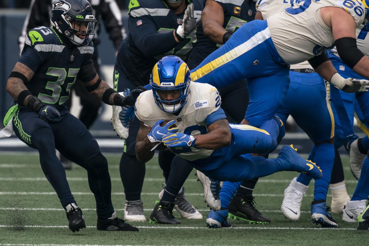 Rams running back Cam Akers dives for extra yardage during the first half Jan. 9, 2021, in Seattle.