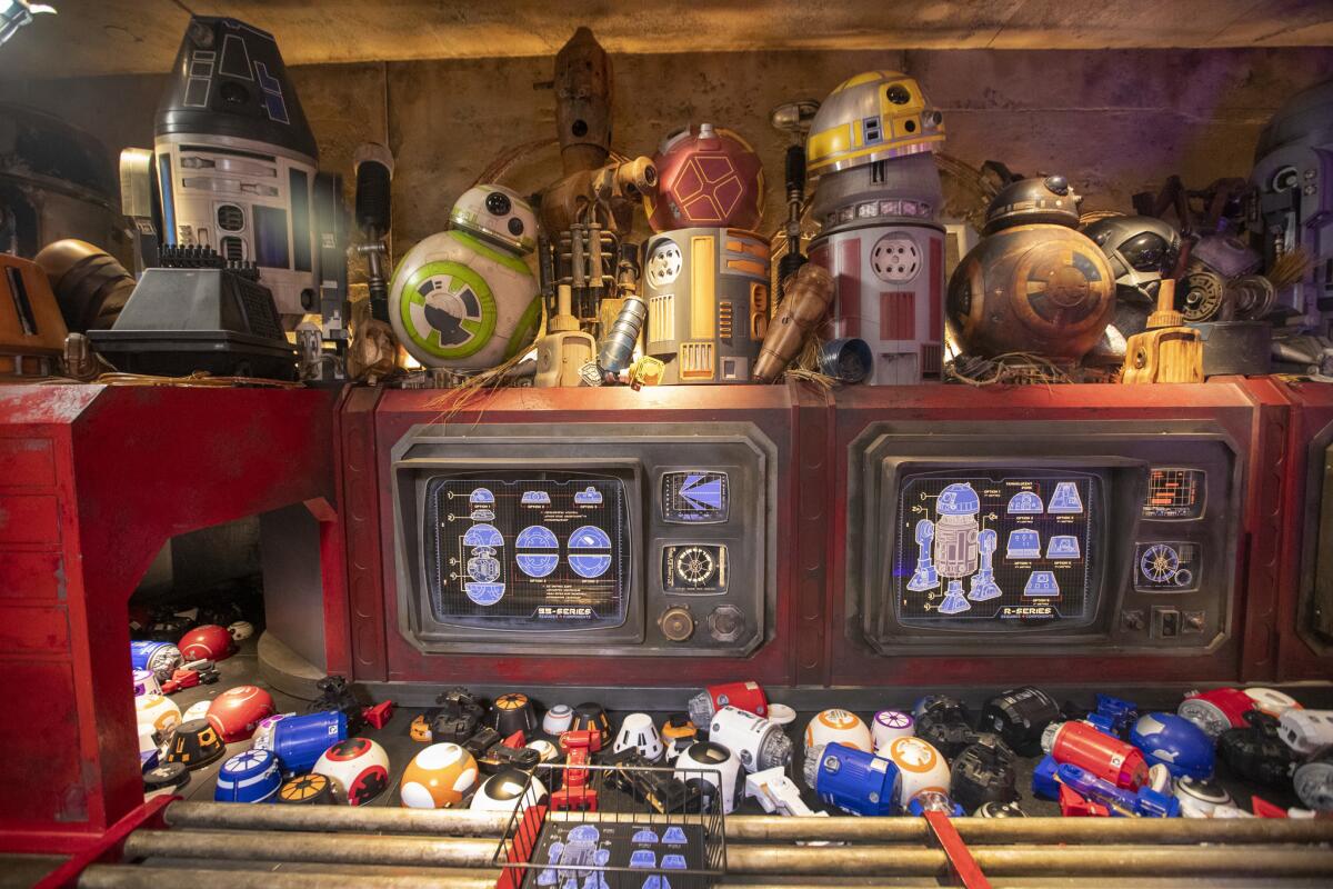Customers can select parts and build their own droid at the Droid Depot.