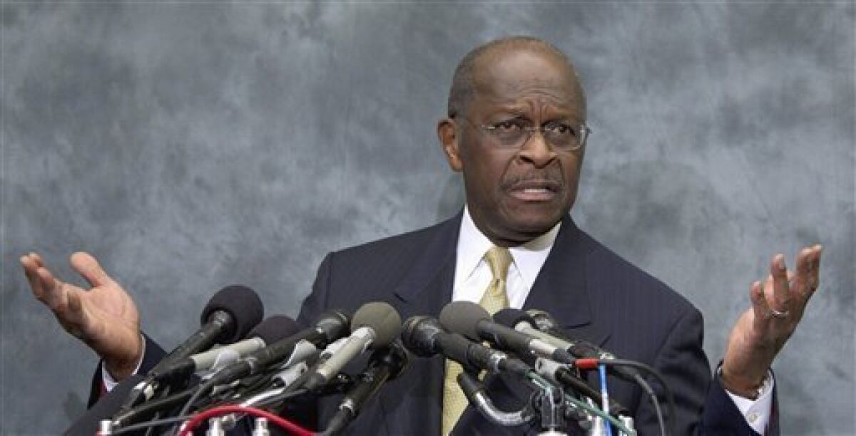 In this Nov. 2, 2011 file photo Republican presidential candidate Herman Cain speaks on Capitol Hill.