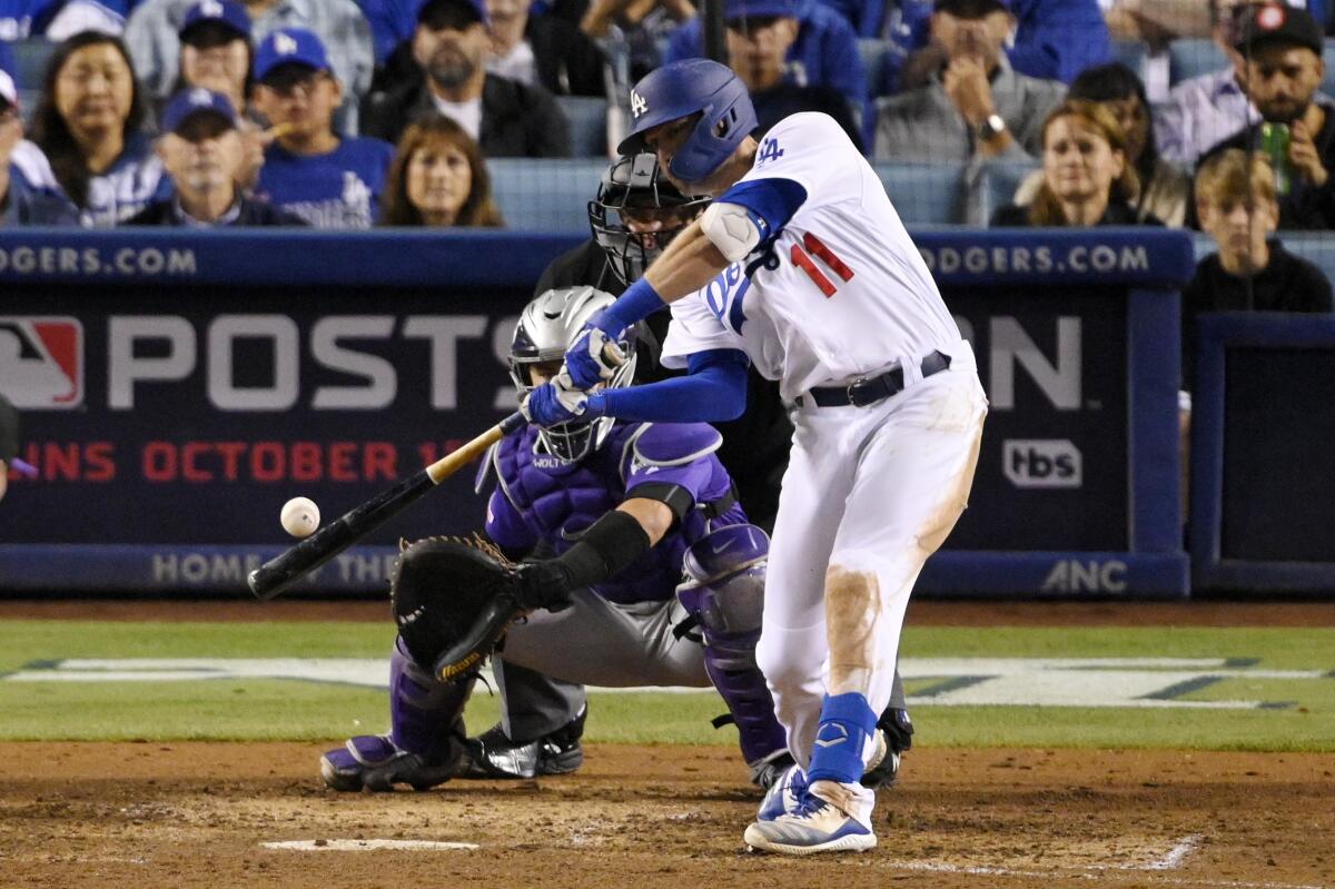 The Dodgers' A.J. Pollock hits a three-run homer in the Dodgers' seven-run fourth inning Sept. 20, 2019.