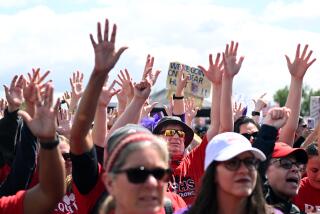 Los Angeles, California March 23, 2023-Protestors listen to speakers as members of the Service Employees International Union Local 99 picket at Los Angeles Historic State Park Thursday. (Wally Skalij/Los Angeles Times)