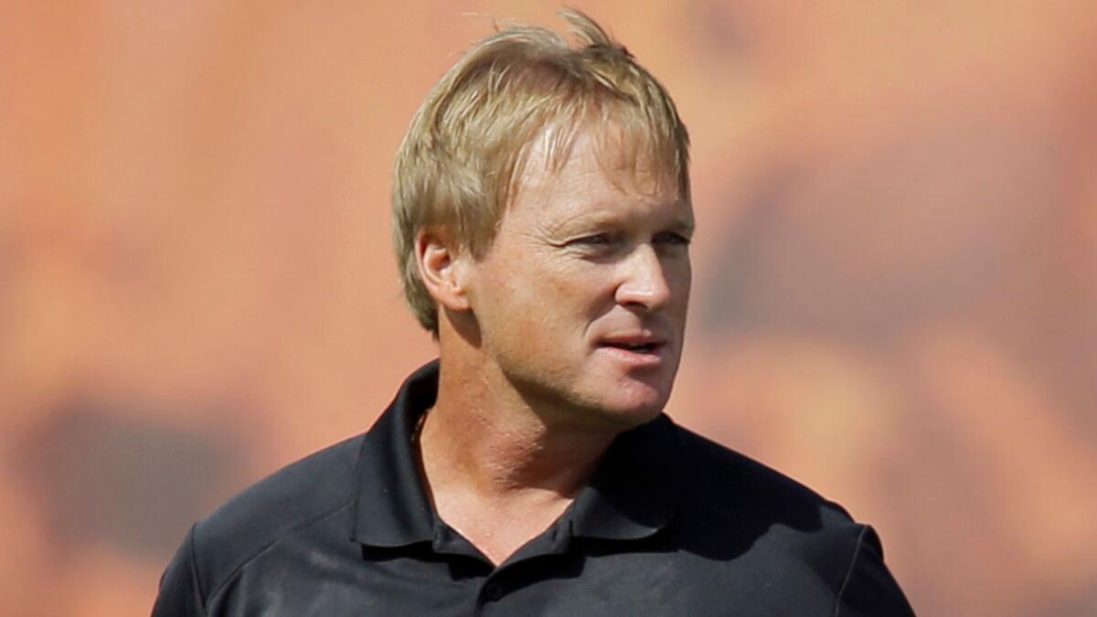 Jon Gruden, shown in 2014, will be announced as the Raiders' head coach on Tuesday, according to multiple media reports,