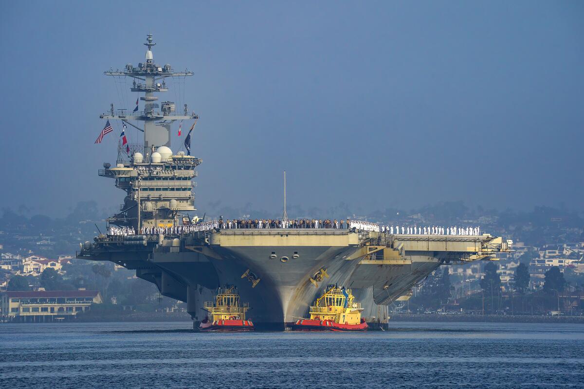 The Abraham Lincoln strike group makes its way into San Diego bay as they returns from deployment.
