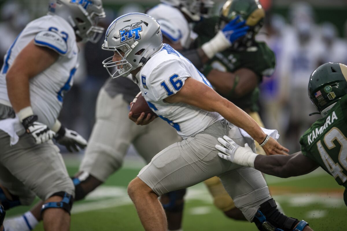 Middle Tennessee State QB Chase Cunningham has passed for 19 touchdowns and rushed for six more this season for Blue Raiders.