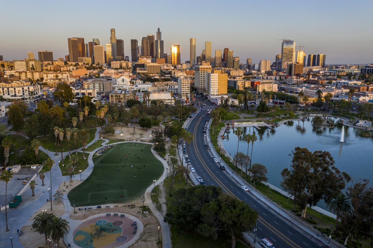  Downtown shines in the setting sun looking East from MacArthur Park during the Coronavirus pandemic