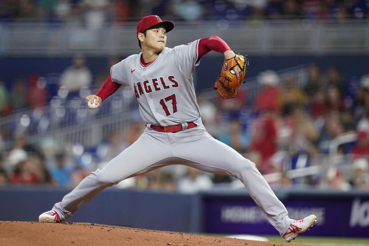 Angels starting pitcher Shohei Ohtani throws game against the Marlins Wednesday in Miami.