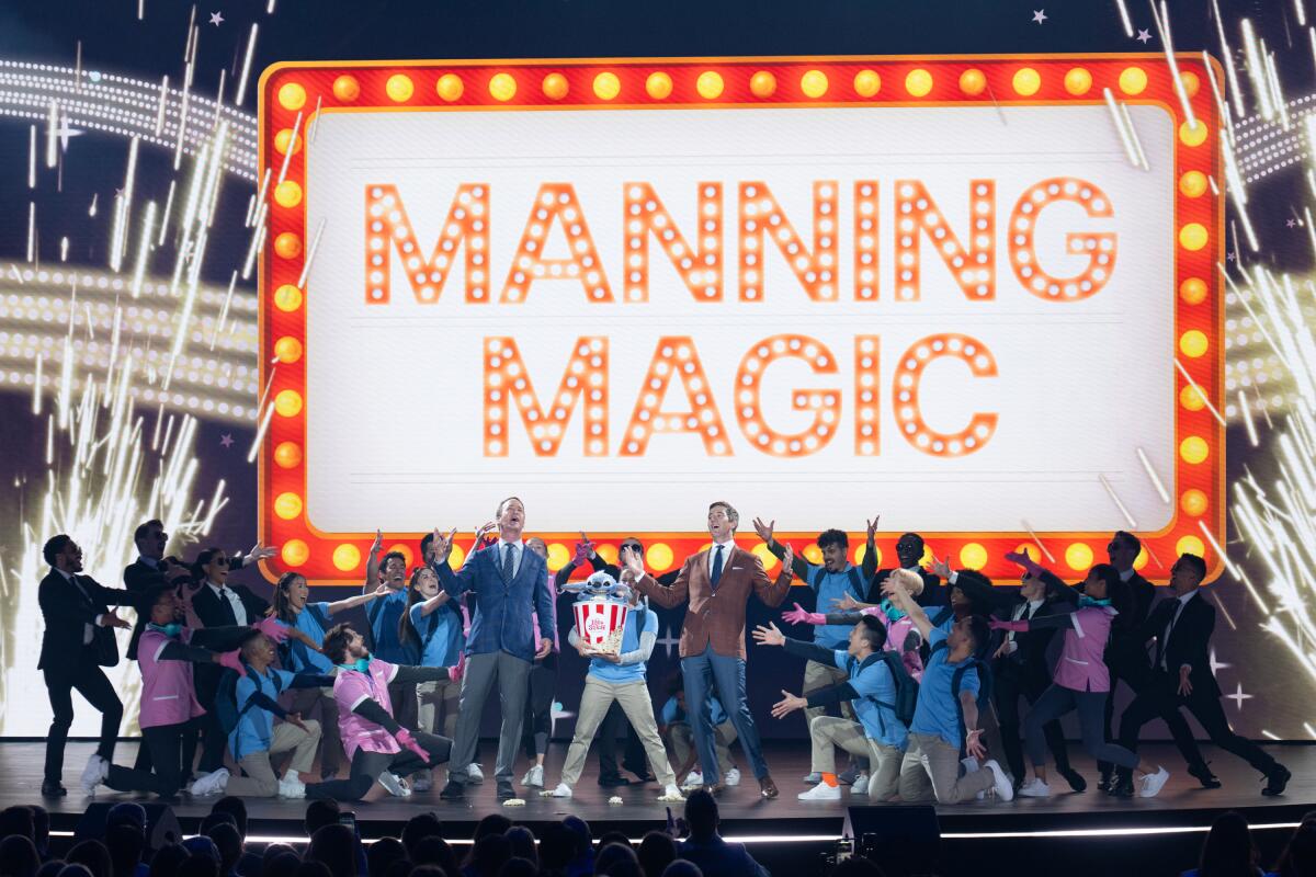 Peyton and Eli Manning perform at the Disney advertiser upfront at North Javits in New York on Tuesday.