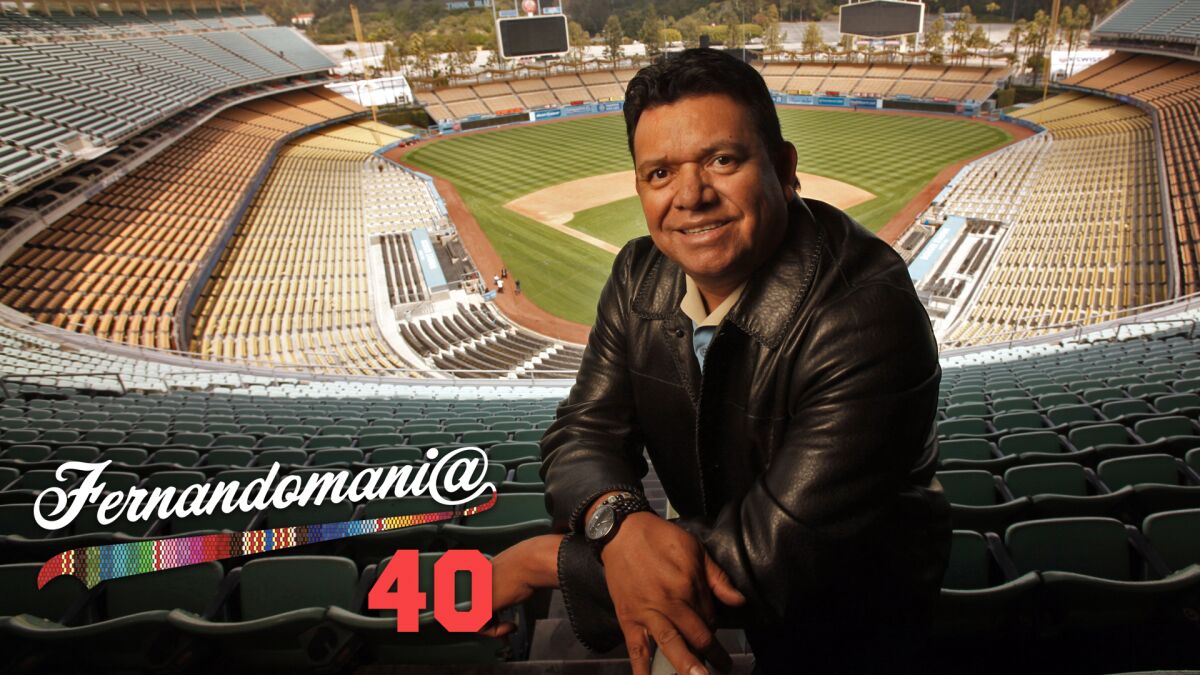 Fernando Valenzuela poses at an empty Dodger Stadium