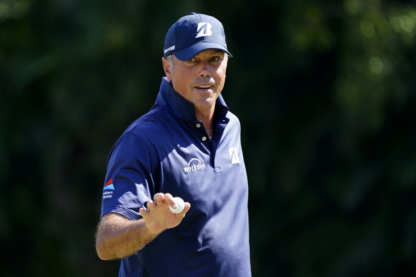 Matt Kuchar acknowledges the gallery after saving par on the first green during the third round of the Sony Open golf tournament, Saturday, Jan. 15, 2022, at Waialae Country Club in Honolulu. (AP Photo/Matt York)