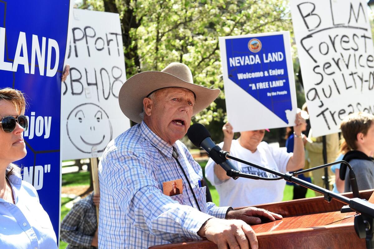 Rancher Cliven Bundy addresses supporters in March outside the Nevada State Legislature building in Carson City, Nev.